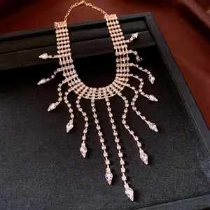 Luxurious gold-tone rhinestone tassel necklace featuring elegant teardrop pendants for women
