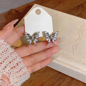 Elegant silver butterfly stud earrings with sparkling zircon stones in minimalist ins style