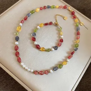 Dopamine style jewelry set featuring colorful gemstone beads and white pearls on display