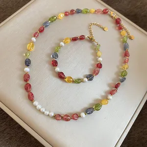 Macro view of the colorful dopamine style gemstone and pearl beaded jewelry set