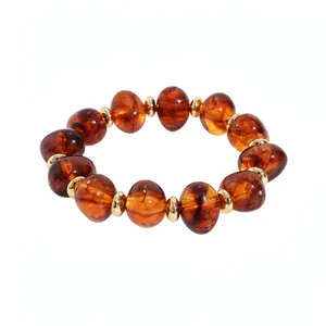 Retro vintage amber marbled acrylic oval beaded stretch bracelet with gold spacer beads