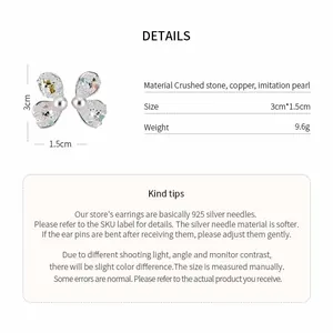 Detailed view of butterfly wing earrings showing size, material, and weight specifications
