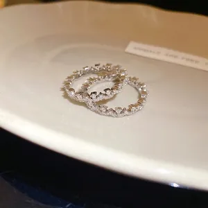 Minimalist silver-colored lace ring with sparkling zircon pavé setting for women