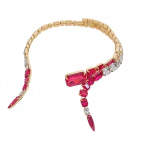 Elegant vintage gold-tone choker necklace featuring rectangular red and clear crystals
