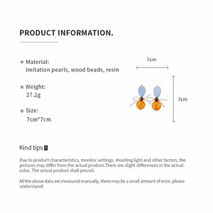 Product detail showing dimensions and material specifications for vintage bow earrings