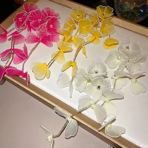 Handmade mesh flower tassel earrings with rhinestones for elegant vacation style
