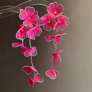 Elegant hot pink mesh flower tassel earrings with rhinestone centers for vacation style