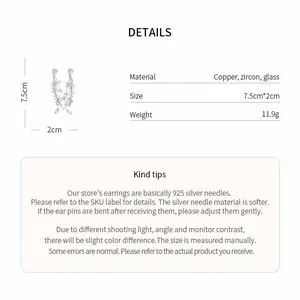 Product details showing long tassel earrings made of copper, zircon, and glass materials