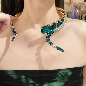 Close-up detail of a vintage emerald green and clear square crystal wrap-around choker necklace