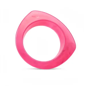 Bold pink geometric resin bracelet with marble pattern on a clean white background.