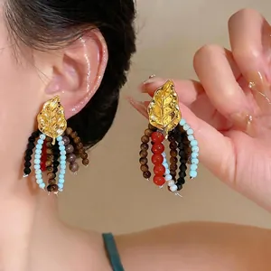 Vintage gold leaf stud earrings with colorful wood and glass bead tassel fringe