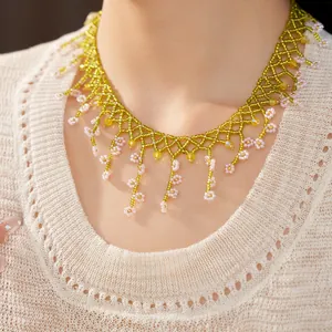 Close-up of bohemian handmade floral beaded necklace for summer vacation style