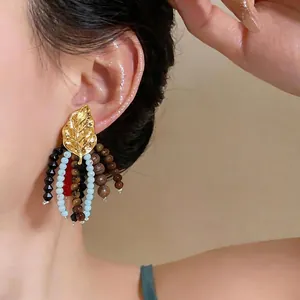 Vintage ethnic style leaf earrings with colorful glass and wood bead tassels