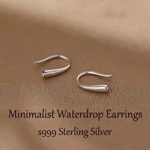 Detailed view of S999 sterling silver minimalist teardrop-shaped hook earrings for women