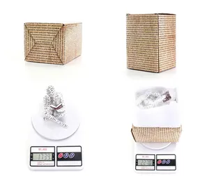 Weight comparison of reading woman resin figurine and its cardboard packaging