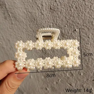 Elegant white pearl flower hair claw clip for women with 8cm length and 5cm height dimensions