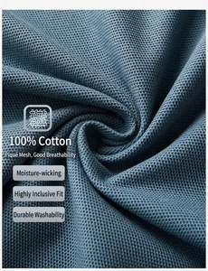 Detailed macro view of high-quality blue 100% cotton pique fabric with breathable mesh texture