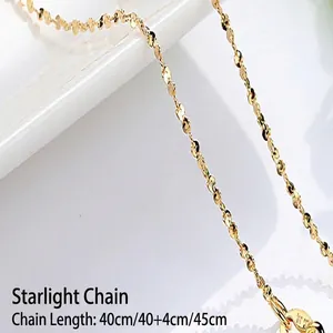 Detailed macro shot of 14K gold plated gypsophila necklace showing textured links