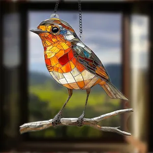 Detailed view of a colorful stained glass bird suncatcher ornament hanging on a tree branch
