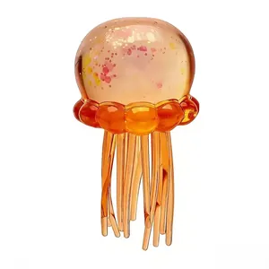 Minimalist translucent orange gradient jellyfish squishy squeeze toy with glitter