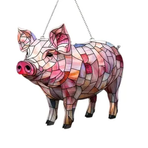 Close-up detail of a colorful stained glass pig suncatcher with intricate mosaic patterns.