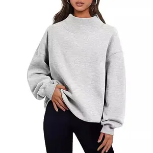 Casual women's oversized grey fleece sweatshirt with mock turtleneck for autumn and winter