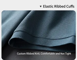 Macro detail of the elastic ribbed cuff on a breathable blue pique cotton polo shirt