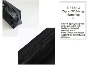Close-up detail of smooth zipper and reinforced stitching on black travel bag