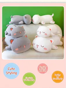 Stack of gray and white plush cat pillows with sleeping expressions for home decor
