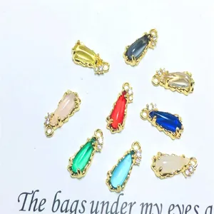 Detail view showing colorful water-drop glass charms with gold-plated zircon edges