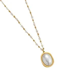 Elegant stainless steel necklace featuring an oval pearl pendant and beaded chain.