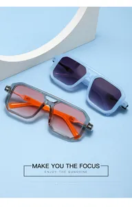 Detailed view of two pairs of trendy double bridge sunglasses in blue and orange gradient