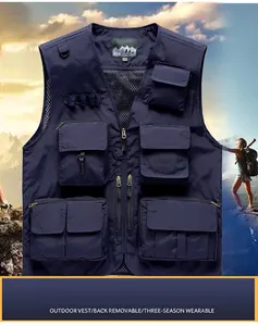 Detail of a dark blue multi-pocket outdoor vest with breathable mesh lining