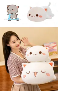 Soft peach cat plush pillow held by a model to show its large size and cozy texture
