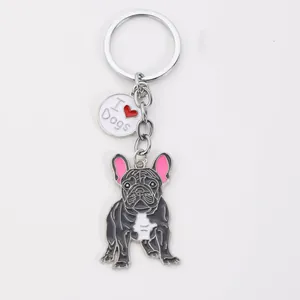Detailed close-up of a French Bulldog keychain featuring an I Love Dogs metal charm
