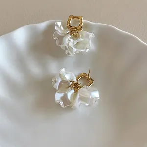 French style white petal drop earrings with elegant gold accents and silver needle posts