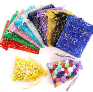Premium colorful organza gift bags featuring gold foil star and moon patterns for gifts