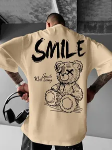 Back detail view of men's oversized khaki streetwear t-shirt with a gothic bear graphic print.