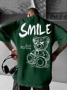 Back detail of men's dark green oversized t-shirt with gothic bear smile print