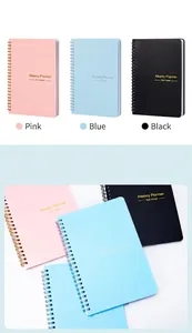 Detailed view of undated weekly planner spiral notebooks available in pink, blue, and black.