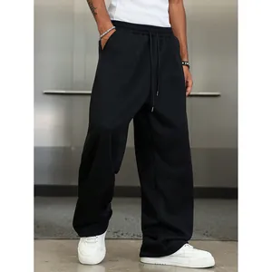 Pantalon de jogging noir ample pour homme avec cordon de serrage et coupe droite moderne
