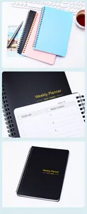 Detail view of non-dated weekly planner with spiral binding and goal setting list