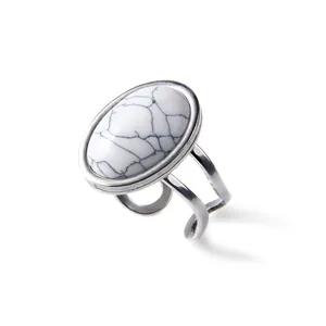 Minimalist silver split band ring with a large oval white turquoise stone decorative element