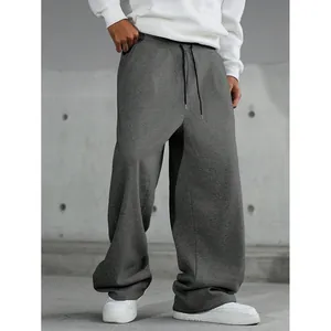 Vue détaillée du pantalon de jogging gris foncé pour homme, coupe large style urbain