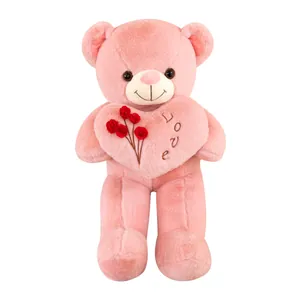 Ours en peluche rose tenant un cœur en peluche avec broderie Love et roses