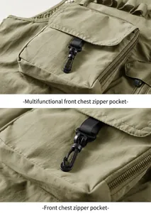 Detail view of tactical vest chest pocket with zipper and durable attachment hook