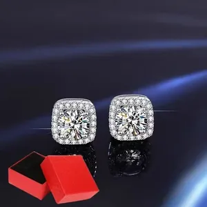Close-up of square halo stud earrings featuring sparkling round-cut moissanite.