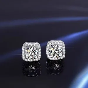 Detailed macro view of sparkling square halo moissanite stud earrings in sterling silver