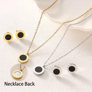 Double-sided Roman numeral necklace and earring jewelry set in gold and silver