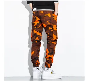 Back view of men's orange camouflage cargo pants with multi-pockets and jogger cuffs